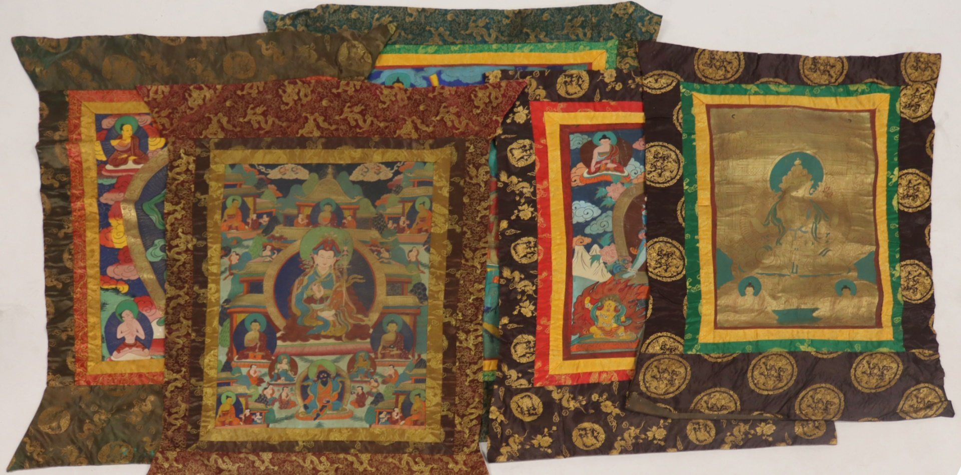 COLLECTION OF (5) TIBETAN THANGKAS.