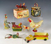 COLLECTION OF 8 TIN LITHO TOYS