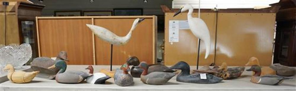 COLLECTION OF A CAST IRON FIGURE OF