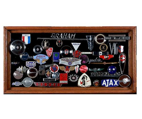 COLLECTION OF AUTOMOBILE BADGES AND