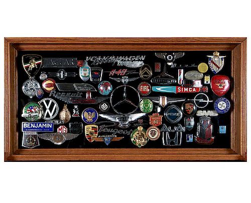 COLLECTION OF AUTOMOBILE BADGES AND