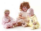 Collection of bisque-head doll