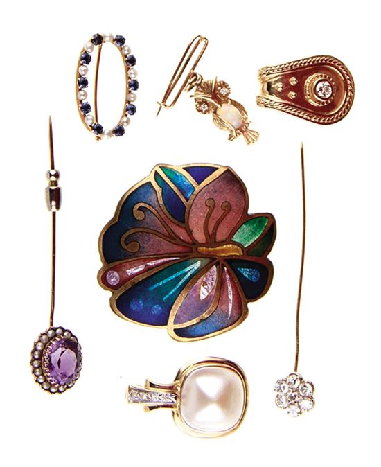 Collection of brooches pendants and