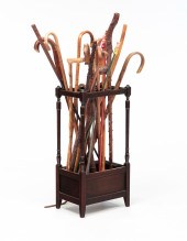 COLLECTION OF CANES IN A STAND