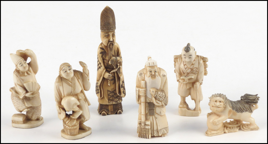 COLLECTION OF CARVED IVORY FIGURES.