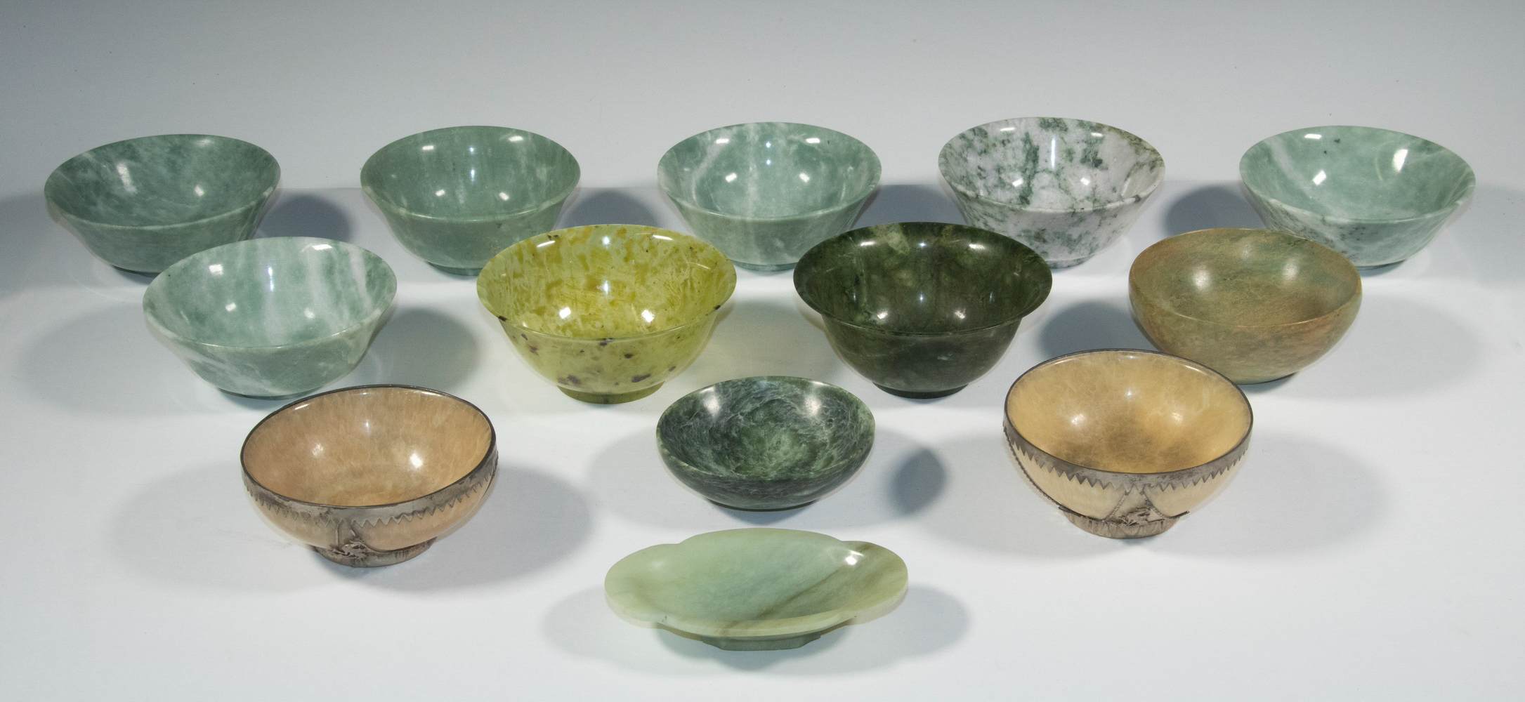 COLLECTION OF CARVED STONE BOWLS