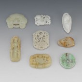 COLLECTION OF EIGHT CARVED JAD