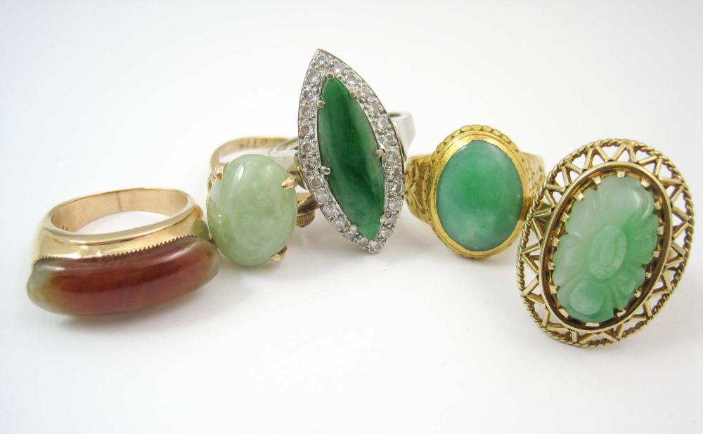 COLLECTION OF FIVE JADE AND GOLD