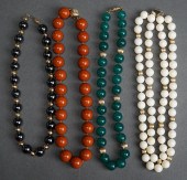 COLLECTION OF FOUR BEADED NECK