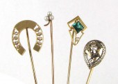 COLLECTION OF FOUR GOLD CRAVAT
