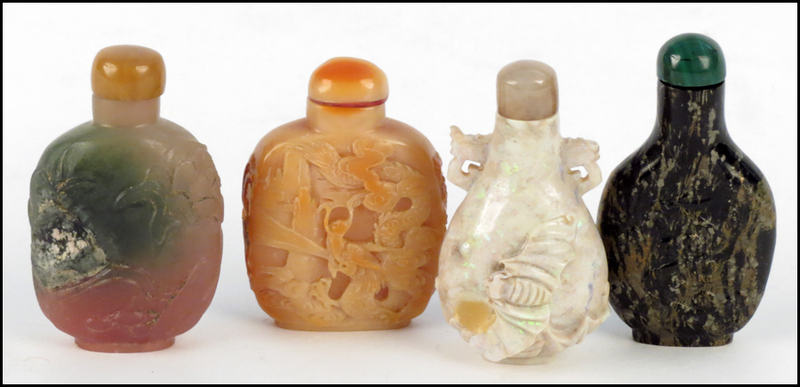 COLLECTION OF FOUR SNUFF BOTTLES.