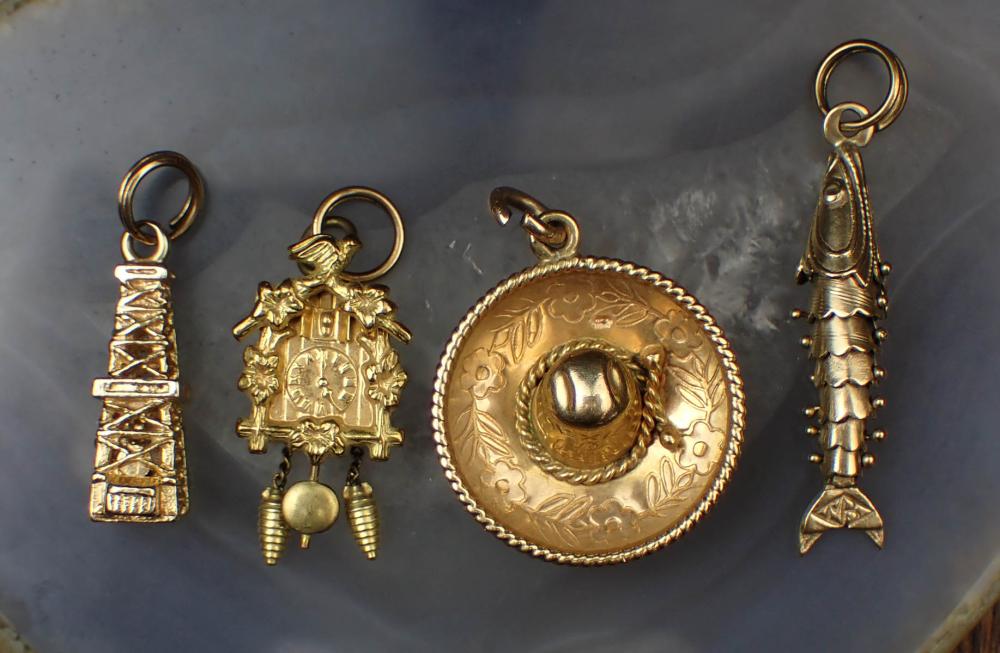 COLLECTION OF FOUR YELLOW GOLD