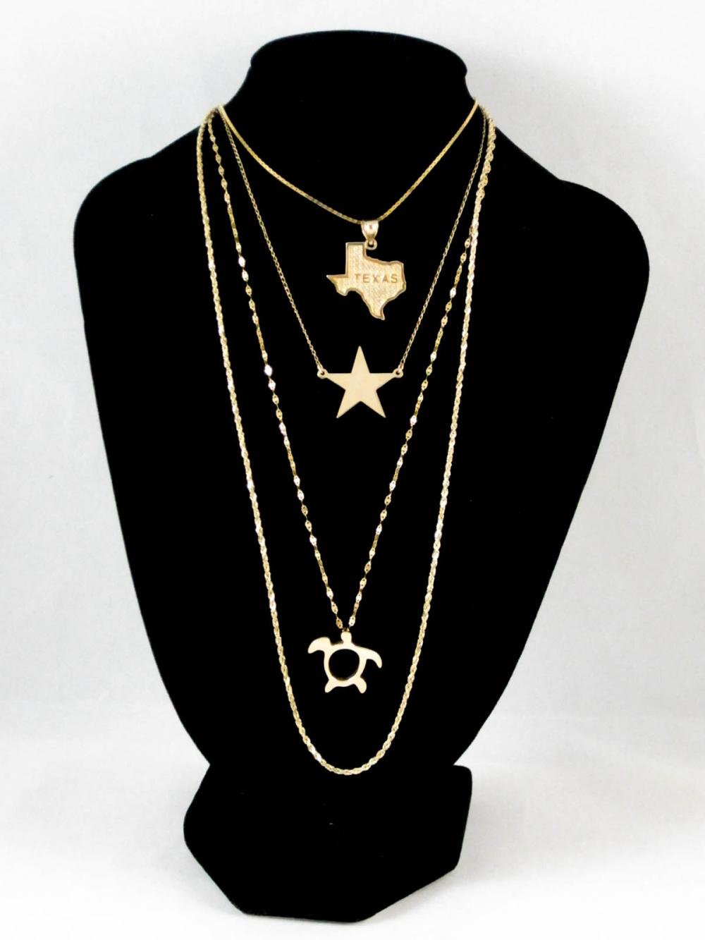 COLLECTION OF FOUR YELLOW GOLD