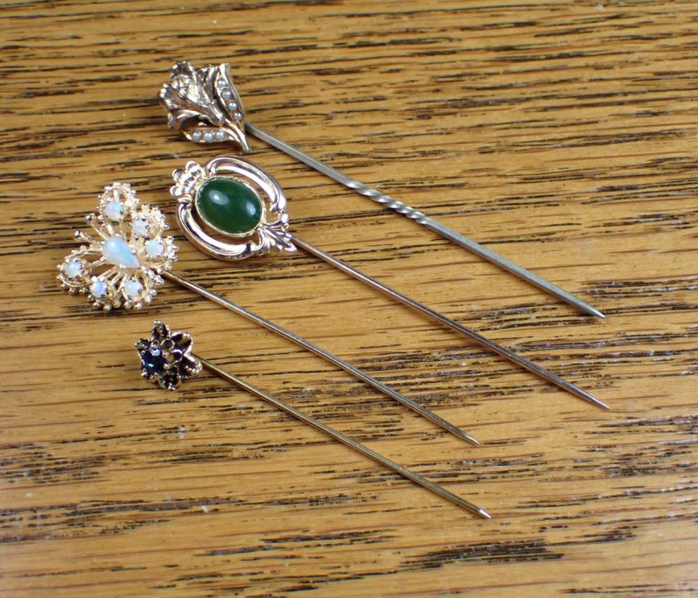 COLLECTION OF FOUR YELLOW GOLD