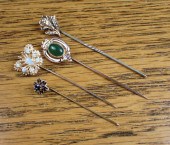 COLLECTION OF FOUR YELLOW GOLD