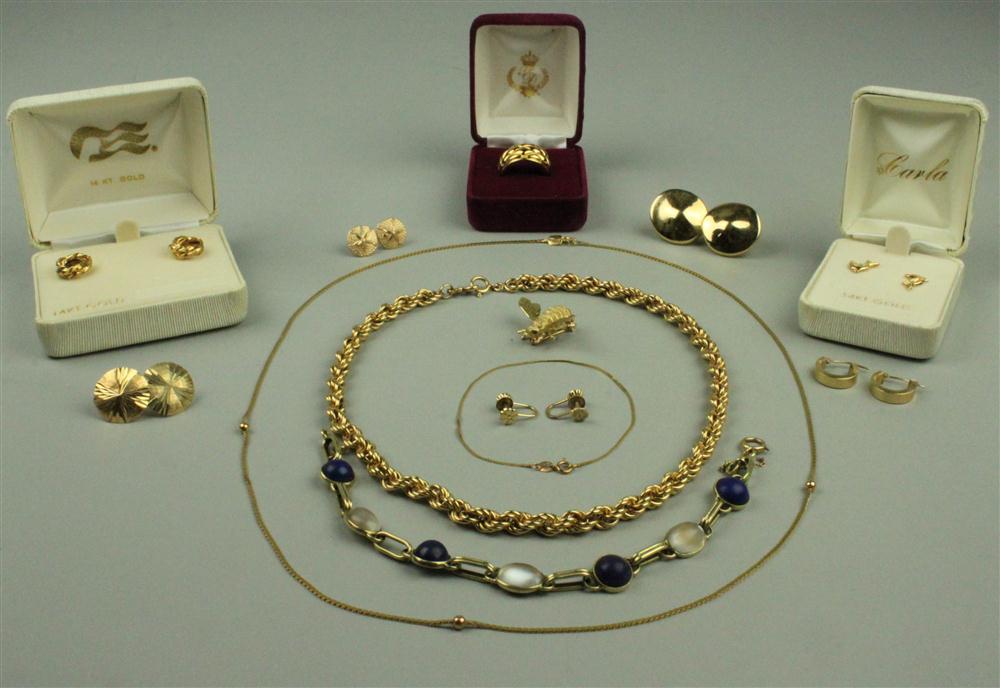 COLLECTION OF GOLD JEWELRY with a