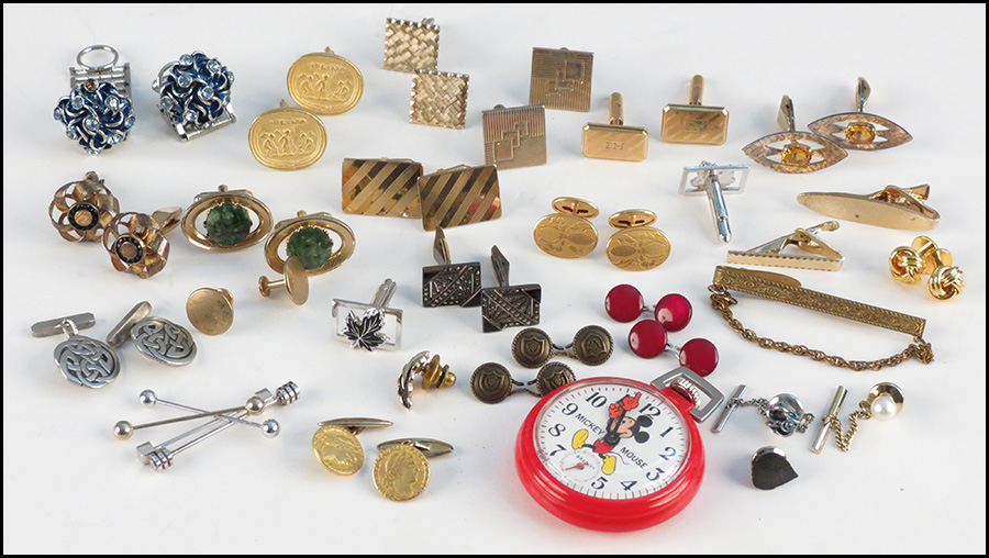COLLECTION OF MEN'S JEWELRY.