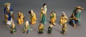 COLLECTION OF MUD FIGURES OF P