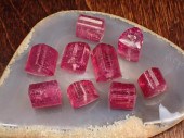 COLLECTION OF NINE PINK TOURMA