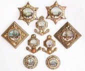 COLLECTION OF NINE SHELL ENCRU