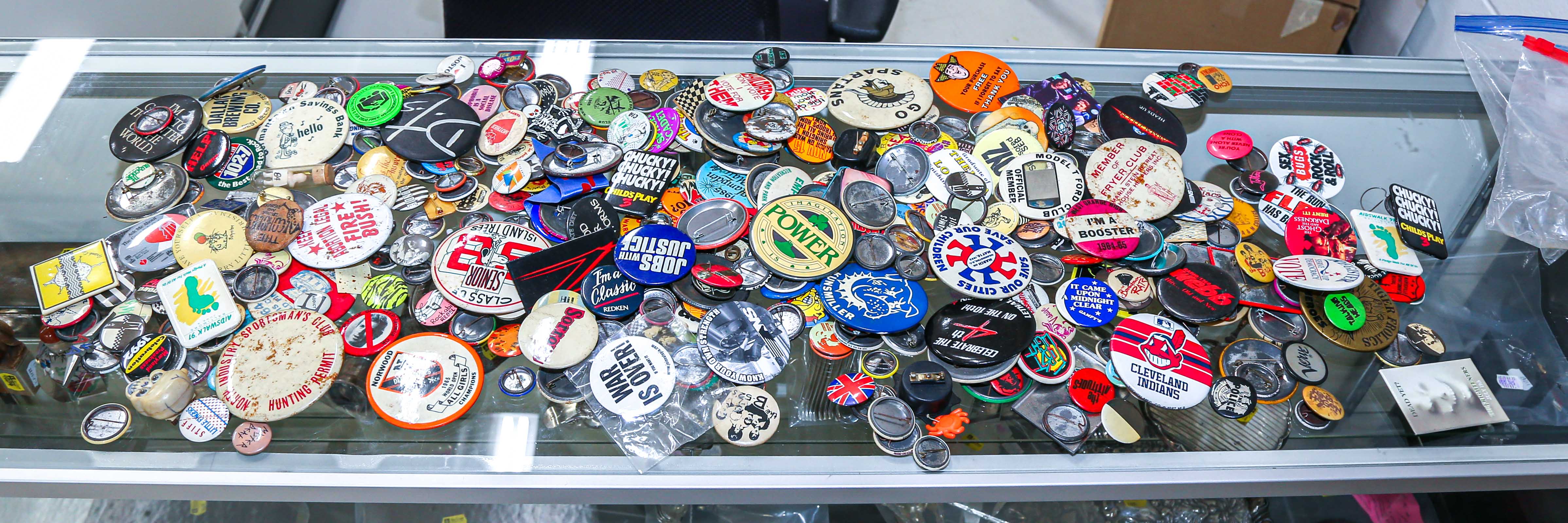 COLLECTION OF PIN-BACK BUTTONS