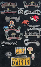 COLLECTION OF PLATE TOPPERS, L
