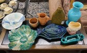 COLLECTION OF POTTERY DISHES,