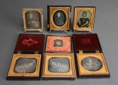 COLLECTION OF SEVEN ENCASED DA