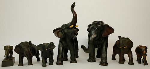 COLLECTION OF SEVEN PATINATED METAL