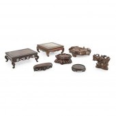 COLLECTION OF SEVEN WOODEN STA