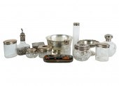 COLLECTION OF SILVER DRESSER A