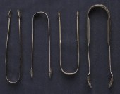 Collection of silver tongs to