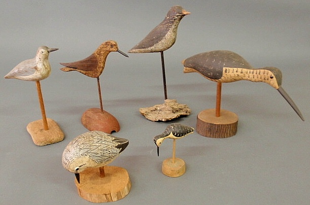 Collection of six carved and