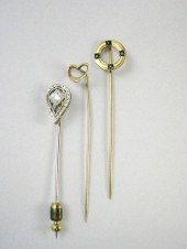 COLLECTION OF THREE GOLD STICK