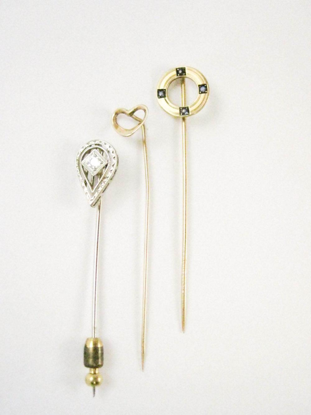 COLLECTION OF THREE GOLD STICK