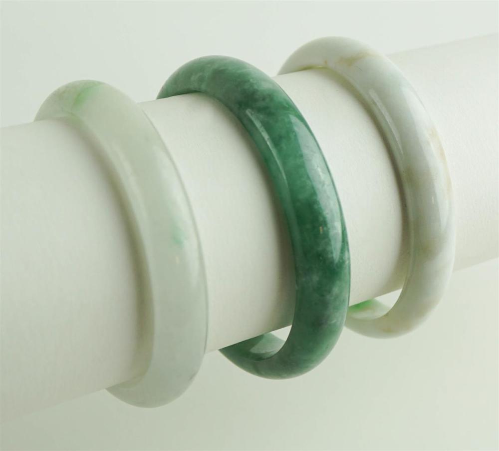 COLLECTION OF THREE JADE BANGLE
