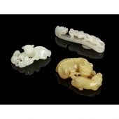 COLLECTION OF THREE JADE CARVI