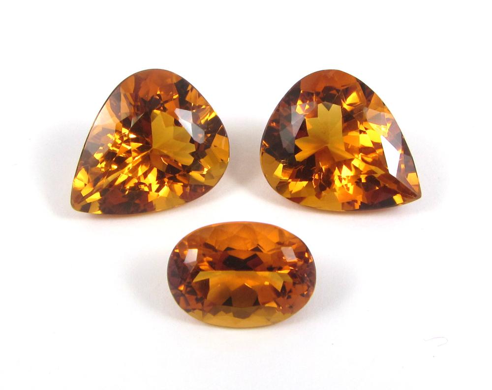 COLLECTION OF THREE UNSET CITRINES,