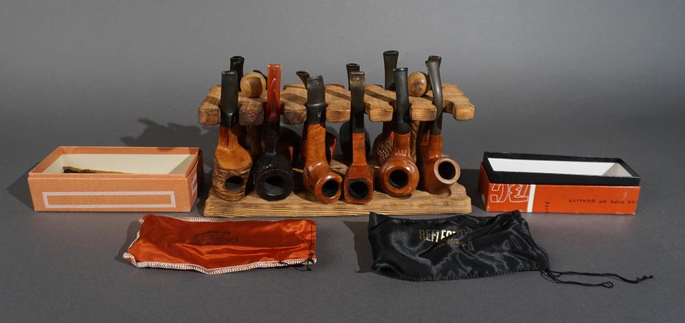 COLLECTION OF WOOD PIPES AND A WOOD