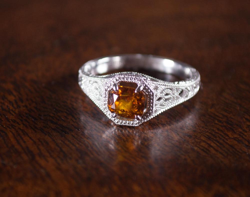 COLORED DIAMOND AND PLATINUM RING