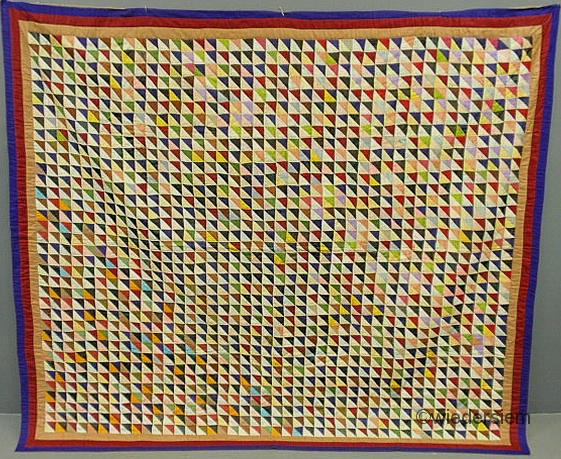 Colorful silk pieced quilt in the