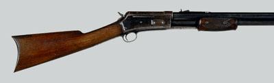 Colt Lightning pump action rifle,