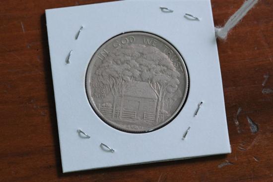 COMMEMORATIVE SILVER HALF DOLLAR.