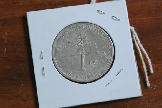 COMMEMORATIVE SILVER HALF DOLLAR.