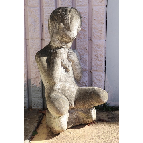 Composite stone seated figure of