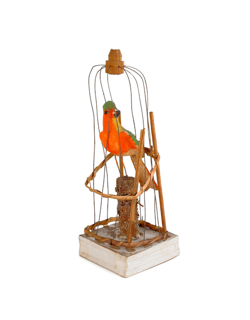 Composition parrot squeak toy in