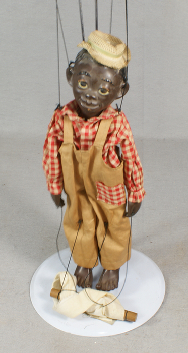 Composition puppet of an African