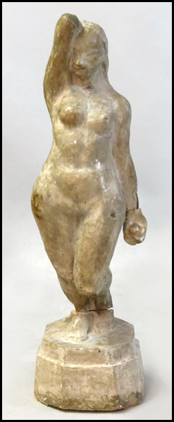 CONCRETE SCULPTURE OF A STANDING