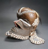 CONGOLESE COWRIE-SHELL CARVED