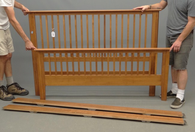 Contemporary bed with rails. 66'' W